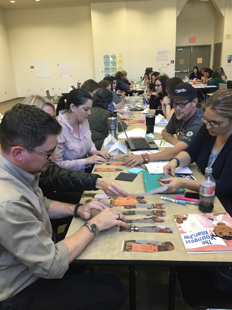 Teachers engage in inquiry lesson using a picture book